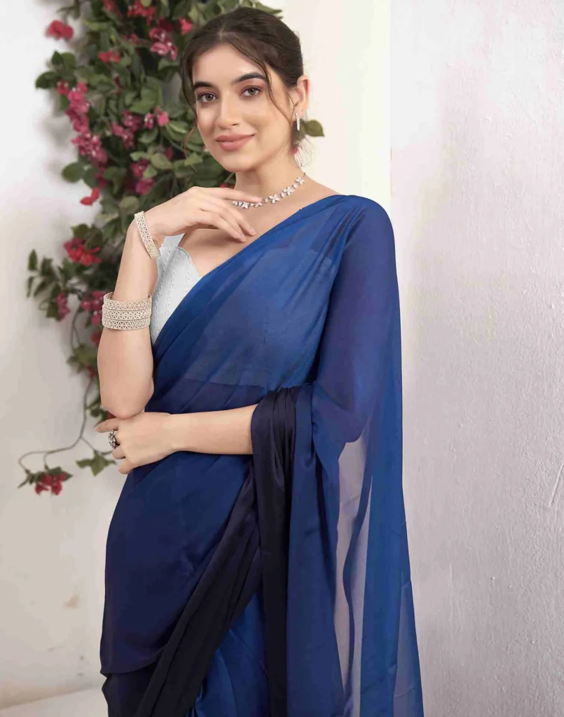 women in blue saree