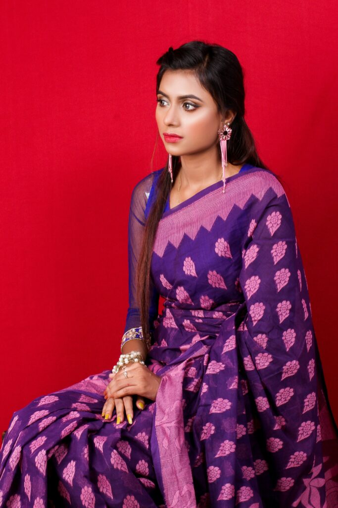 women in violet saree