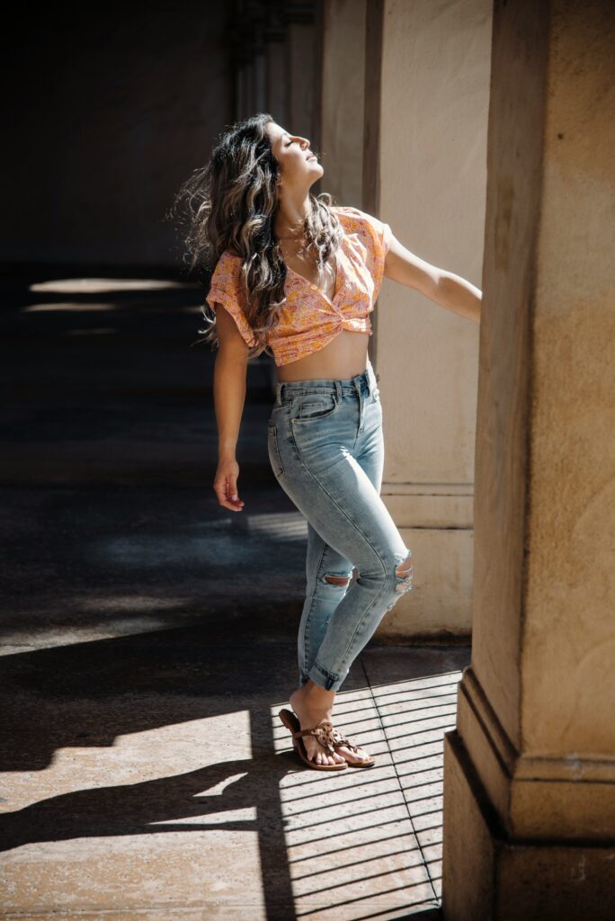 women in blue scratch model jeans