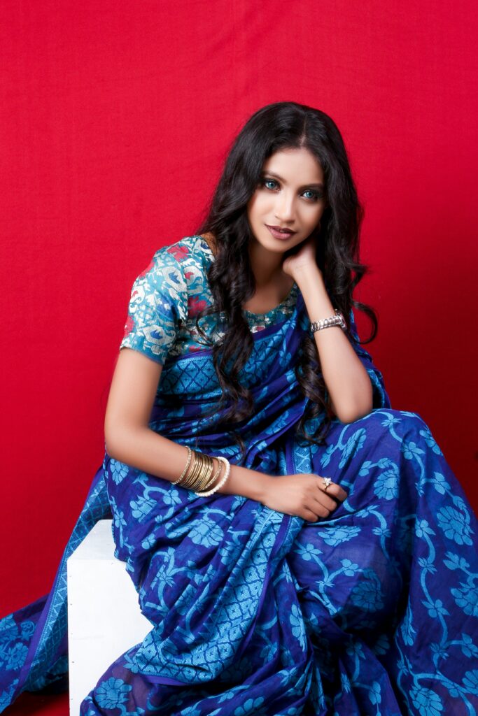 Gorgeous women in navy blue saree