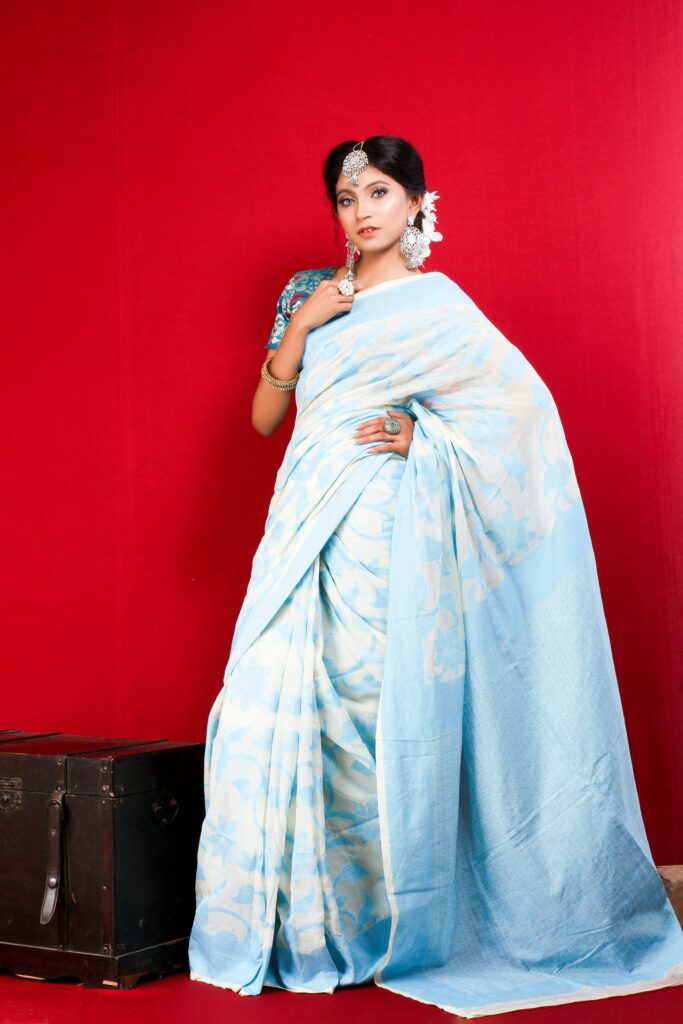 Model in light blue saree