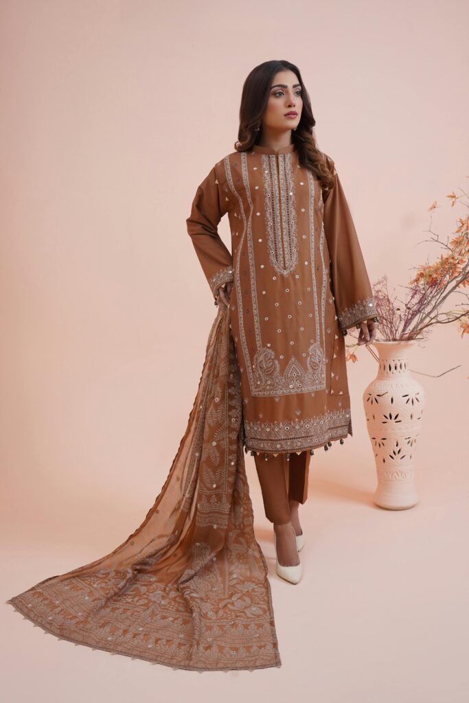 Women in light brown salwar