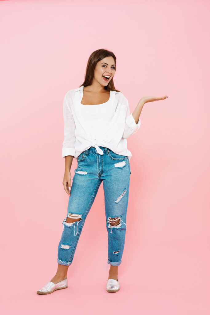Women In Modern Jeans With Top